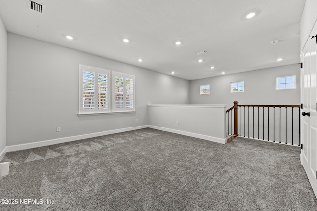 95058 Rocky Pl, Fernandina Beach, FL 32034 - carpeted spare room with recessed lighting, visible vents, and plenty of natural light