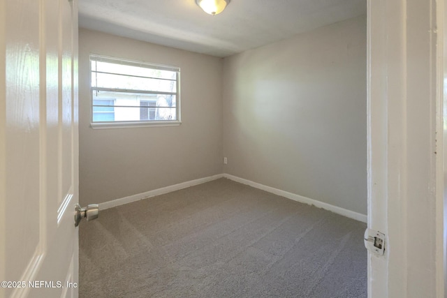 2108 W 15th St, Jacksonville, FL 32209 - carpeted empty room featuring baseboards