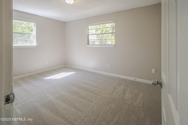 2108 W 15th St, Jacksonville, FL 32209 - unfurnished room with baseboards and carpet flooring