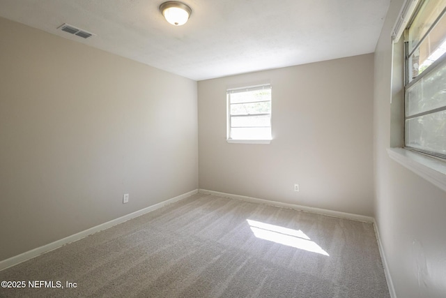 2108 W 15th St, Jacksonville, FL 32209 - carpeted spare room with visible vents and baseboards