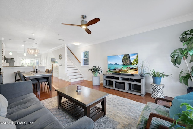 2114 Gail Ave Unit A, Jacksonville Beach, FL 32250 - living area with stairway, baseboards, ornamental molding, and wood finished floors