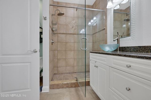 2114 Gail Ave Unit A, Jacksonville Beach, FL 32250 - full bathroom with tile patterned floors, vanity, and a shower stall