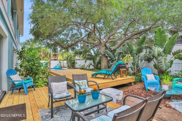 2114 Gail Ave Unit A, Jacksonville Beach, FL 32250 - view of patio featuring a fenced backyard and a deck