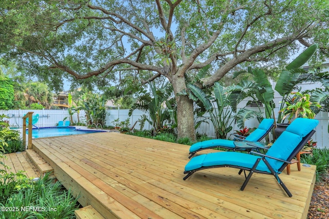 2114 Gail Ave Unit A, Jacksonville Beach, FL 32250 - deck featuring a fenced backyard and a fenced in pool