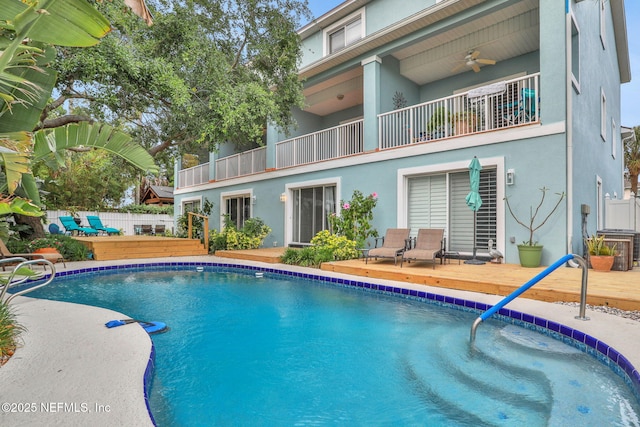 2114 Gail Ave Unit A, Jacksonville Beach, FL 32250 - view of swimming pool with fence, a ceiling fan, a fenced in pool, and a deck
