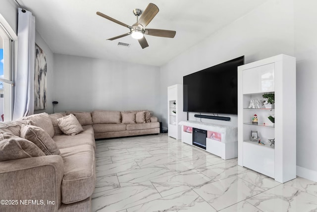 11 Reeding Ridge Dr W, Jacksonville, FL 32225 - living area with visible vents, marble finish floor, and ceiling fan