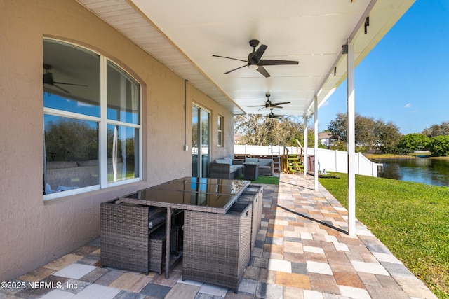 11 Reeding Ridge Dr W, Jacksonville, FL 32225 - view of patio featuring outdoor lounge area, a water view, a ceiling fan, and fence