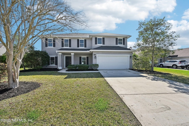 traditional-style home with a front yard, a garage, driveway, and stucco siding