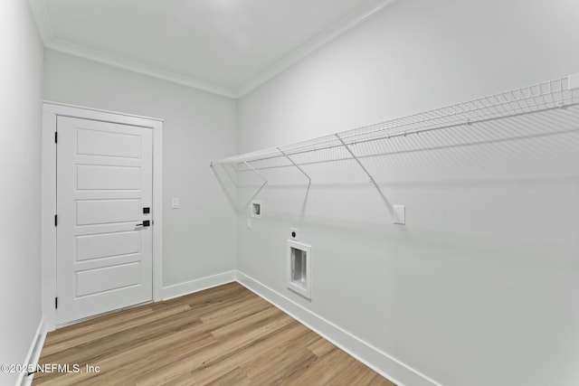 85172 Southern Creek Blvd, Fernandina Beach, FL 32034 - laundry area featuring laundry area, baseboards, light wood-type flooring, hookup for an electric dryer, and ornamental molding