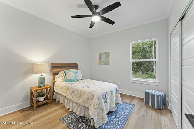 85172 Southern Creek Blvd, Fernandina Beach, FL 32034 - bedroom with light wood-style floors, baseboards, ornamental molding, and a ceiling fan