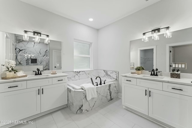 85172 Southern Creek Blvd, Fernandina Beach, FL 32034 - bathroom with a sink, two vanities, and a chandelier