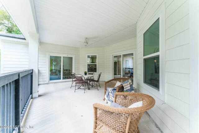 85172 Southern Creek Blvd, Fernandina Beach, FL 32034 - view of patio with ceiling fan and outdoor dining area