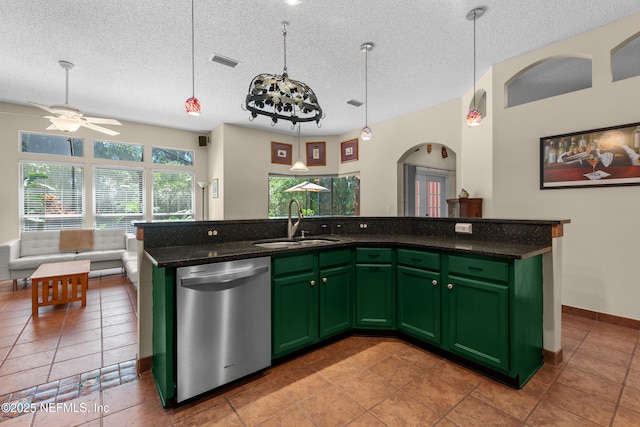 5266 Camelot Forest Dr, Jacksonville, FL 32258 - kitchen with stainless steel dishwasher, green cabinetry, a sink, and visible vents