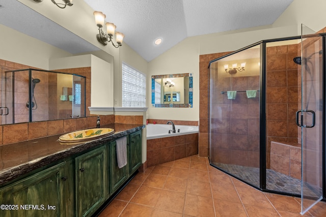 5266 Camelot Forest Dr, Jacksonville, FL 32258 - bathroom with a shower stall, tile patterned floors, a garden tub, and vaulted ceiling