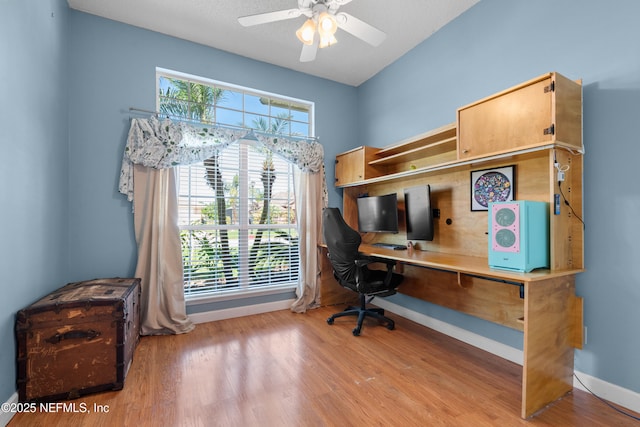 5266 Camelot Forest Dr, Jacksonville, FL 32258 - home office featuring baseboards, ceiling fan, and wood finished floors