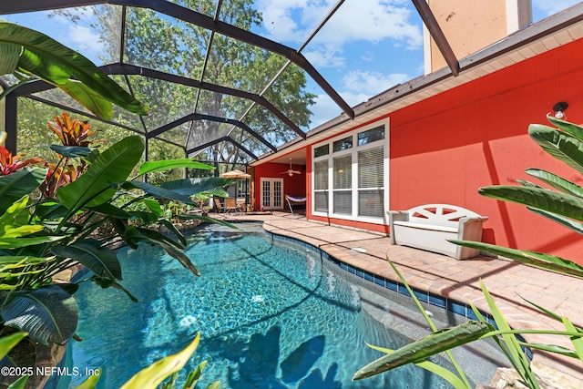5266 Camelot Forest Dr, Jacksonville, FL 32258 - pool with a patio, french doors, glass enclosure, and ceiling fan