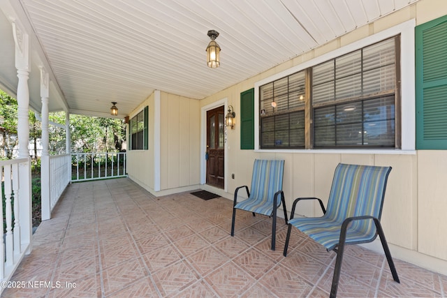 view of patio featuring a porch