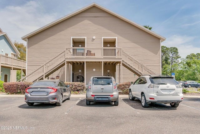 1601 Nectarine St Unit D5, Fernandina Beach, FL 32034 - view of front of property with uncovered parking and stairs