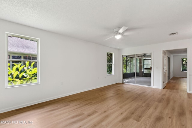13706 Wm Davis Pkwy, Jacksonville, FL 32224 - unfurnished room featuring a ceiling fan and light wood finished floors