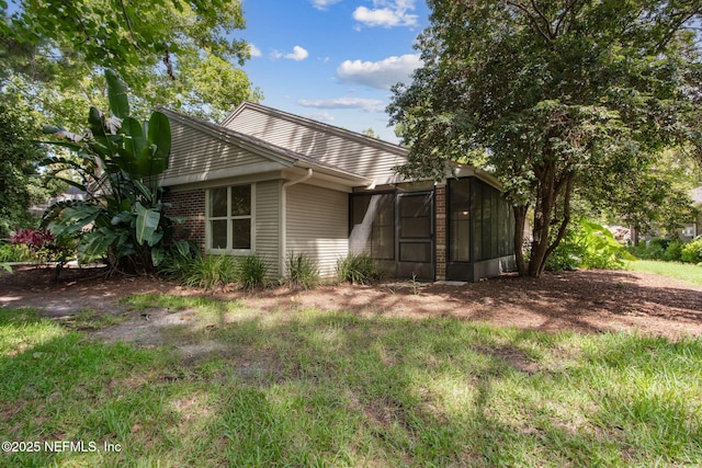 13706 Wm Davis Pkwy, Jacksonville, FL 32224 - rear view of house with a sunroom