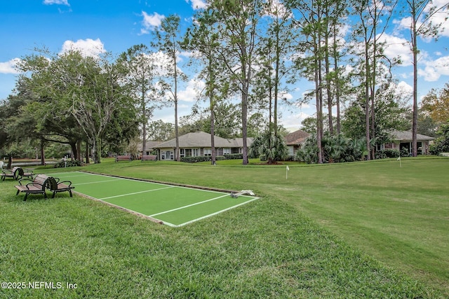 13706 Wm Davis Pkwy, Jacksonville, FL 32224 - view of home's community with a game area and a lawn