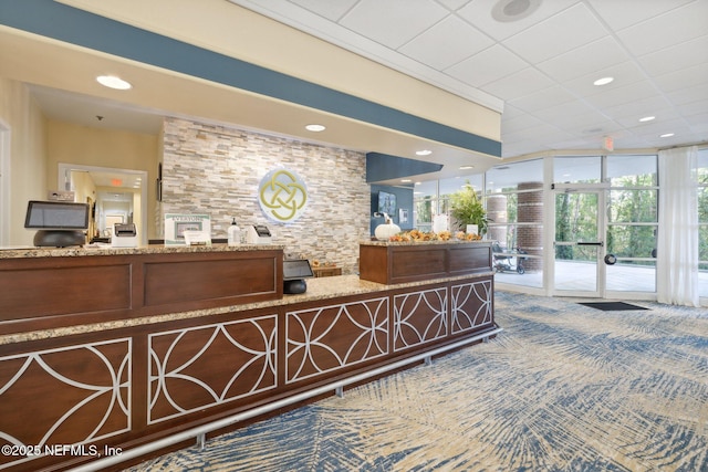 13706 Wm Davis Pkwy, Jacksonville, FL 32224 - reception area with a wall of windows and recessed lighting