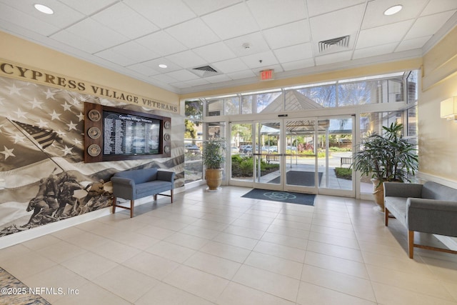 13706 Wm Davis Pkwy, Jacksonville, FL 32224 - building lobby with a drop ceiling, recessed lighting, and ornamental molding