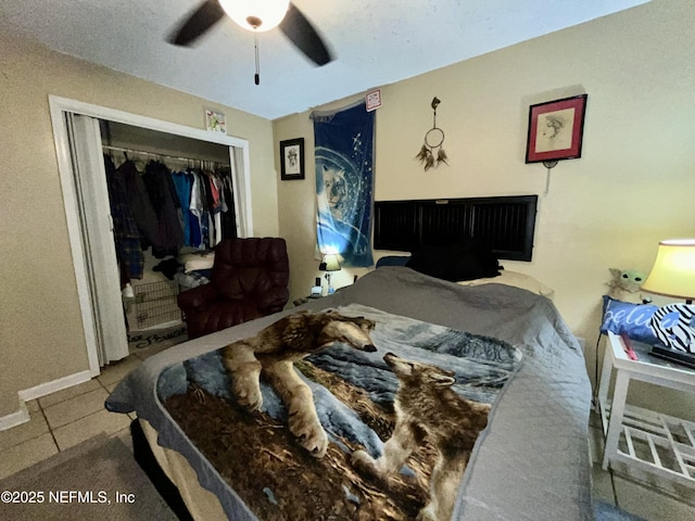 205 Harbor Dr, Palatka, FL 32177 - bedroom with a ceiling fan, a closet, and baseboards
