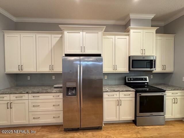 2924 Captiva Bluff Rd S, Jacksonville, FL 32226 - kitchen featuring stone countertops, tasteful backsplash, ornamental molding, and appliances with stainless steel finishes