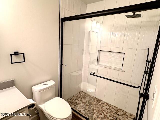 2924 Captiva Bluff Rd S, Jacksonville, FL 32226 - full bath with toilet, a stall shower, and vanity