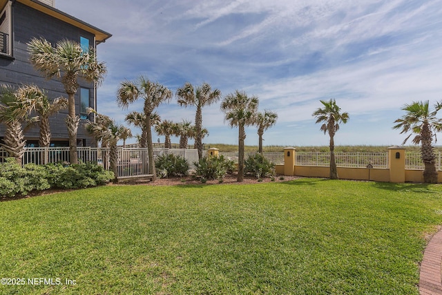 view of yard with fence