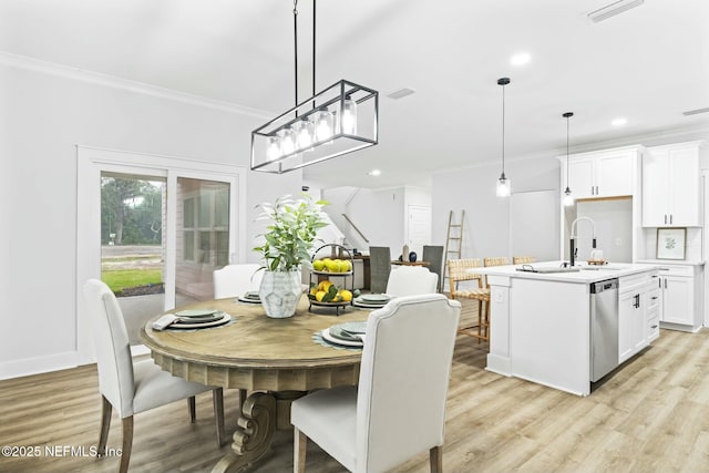 85199 Southern Creek Blvd, Fernandina Beach, FL 32034 - dining room with visible vents, stairs, light wood-style floors, ornamental molding, and recessed lighting