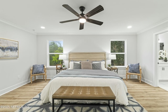 85199 Southern Creek Blvd, Fernandina Beach, FL 32034 - bedroom with baseboards, ornamental molding, ensuite bathroom, and light wood-style flooring