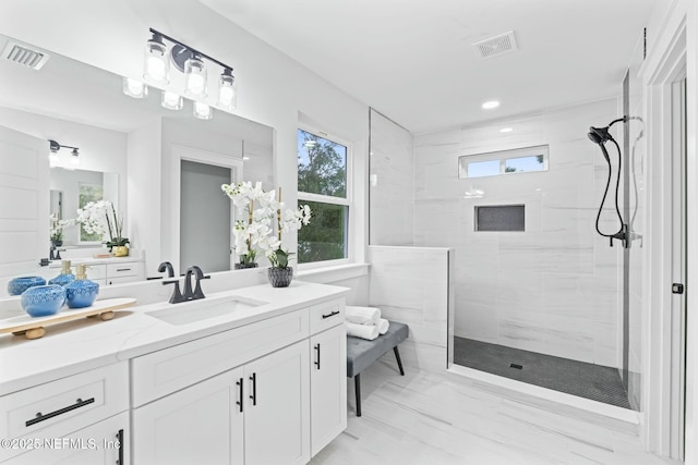 85199 Southern Creek Blvd, Fernandina Beach, FL 32034 - bathroom featuring visible vents, marble finish floor, a walk in shower, and vanity