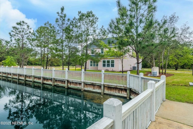 85199 Southern Creek Blvd, Fernandina Beach, FL 32034 - view of dock featuring a lawn and a water view