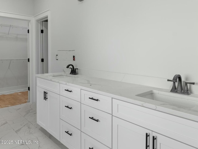 85118 Southern Creek Blvd, Fernandina Beach, FL 32034 - full bath featuring a sink, marble finish floor, and a spacious closet
