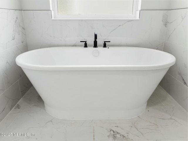 85118 Southern Creek Blvd, Fernandina Beach, FL 32034 - full bath featuring tile walls, a soaking tub, and marble finish floor
