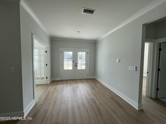 85118 Southern Creek Blvd, Fernandina Beach, FL 32034 - entrance foyer with baseboards, visible vents, ornamental molding, and wood finished floors