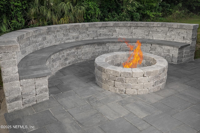 85118 Southern Creek Blvd, Fernandina Beach, FL 32034 - exterior details with an outdoor fire pit
