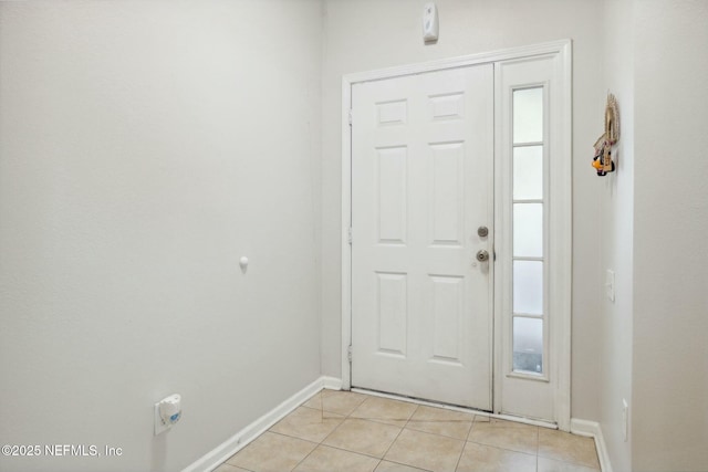 7990 Baymeadows Rd E Unit 2202, Jacksonville, FL 32256 - foyer entrance with light tile patterned floors and baseboards