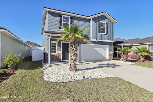 view of front of home featuring concrete driveway, a garage, board and batten siding, and stone siding