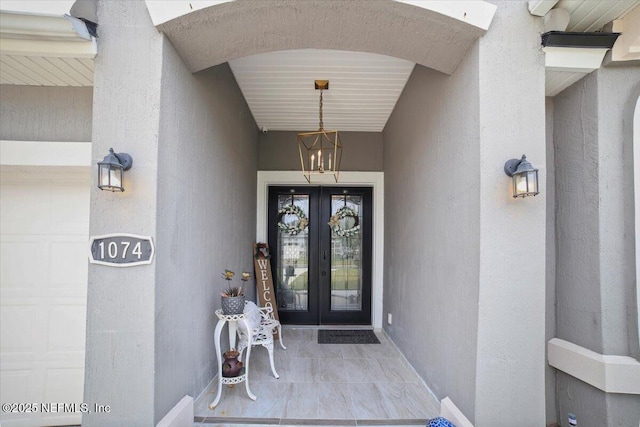 1074 Spanish Bay Ct, Orange Park, FL 32065 - entrance to property with stucco siding and french doors