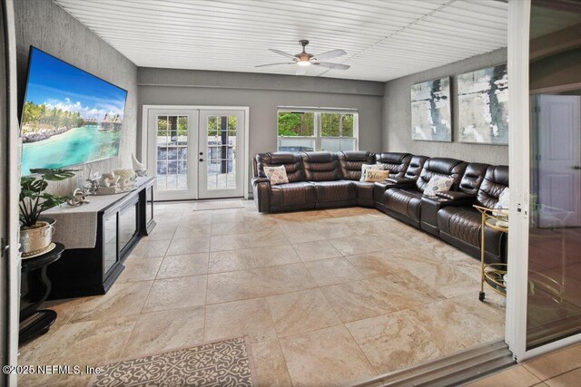 1074 Spanish Bay Ct, Orange Park, FL 32065 - living room with french doors, light tile patterned floors, and ceiling fan