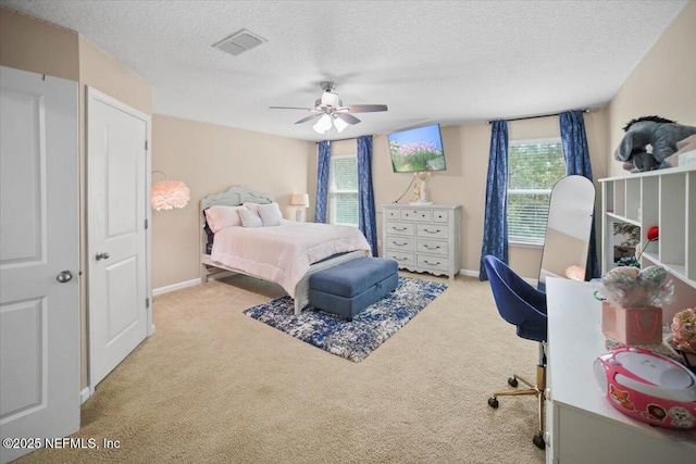 1074 Spanish Bay Ct, Orange Park, FL 32065 - bedroom featuring a ceiling fan, carpet floors, a textured ceiling, and visible vents