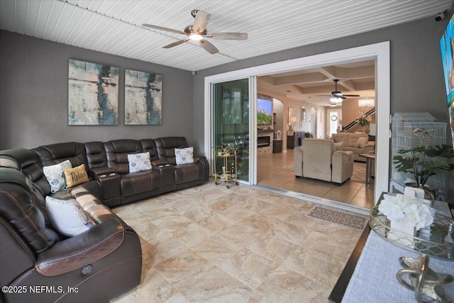 1074 Spanish Bay Ct, Orange Park, FL 32065 - living area with coffered ceiling, beamed ceiling, and a ceiling fan