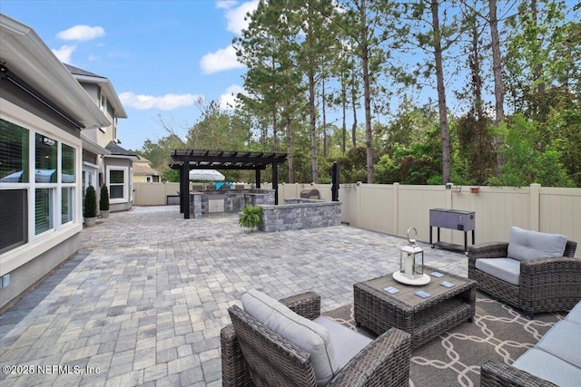 1074 Spanish Bay Ct, Orange Park, FL 32065 - view of patio with an outdoor living space, a fenced backyard, area for grilling, and a pergola