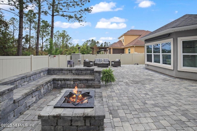 1074 Spanish Bay Ct, Orange Park, FL 32065 - view of patio / terrace featuring a fenced backyard and an outdoor living space with a fire pit
