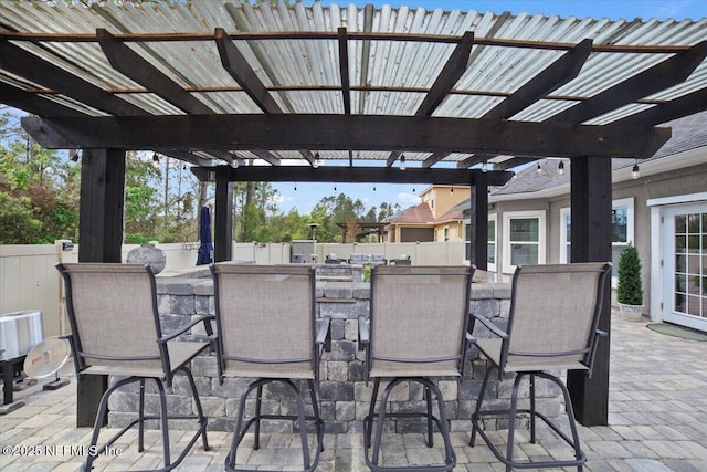 1074 Spanish Bay Ct, Orange Park, FL 32065 - view of patio / terrace featuring fence, a pergola, and outdoor dry bar