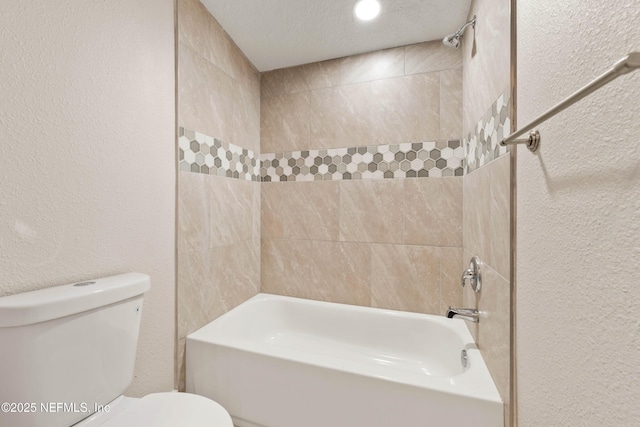 3824 Springfield Blvd, Jacksonville, FL 32206 - full bathroom with a textured ceiling, toilet,  shower combination, and a textured wall