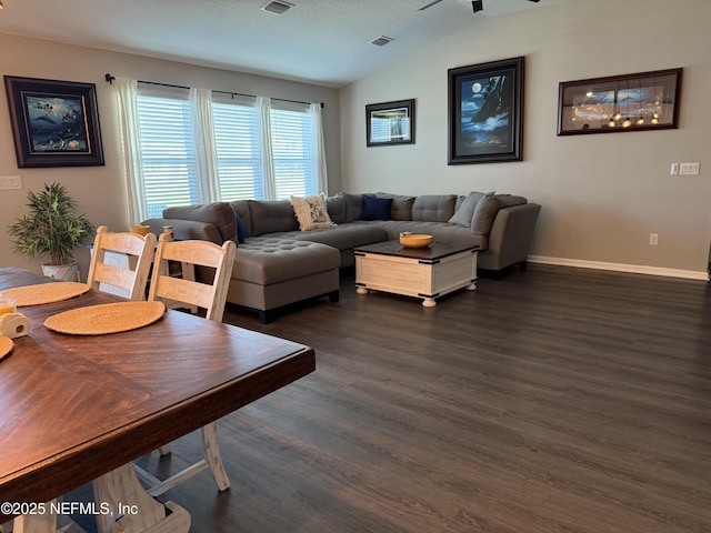 665 Flach Dr, Saint Johns, FL 32259 - living area featuring dark wood-type flooring, vaulted ceiling, and baseboards